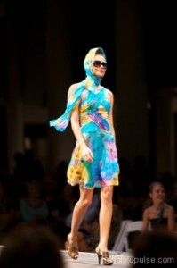 on the runway at the Couture Hawaii Fashion Show