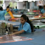 This worker is sowing a panel for a Panther.