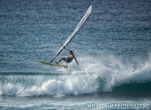 Throwing the hand off in a little air.