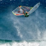 Kevin Pritchard throws a big gnarly back loop off-the-lip at Hookipa Point.