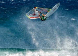 Kevin Pritchard throws a big gnarly back loop off-the-lip at Hookipa Point.