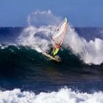 Carving the board back around in a cutback.