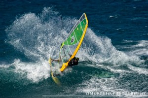 Slashing the face off a wave.