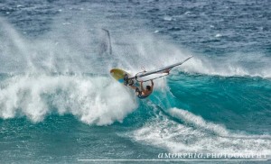 Hitting the lip on a Sunday swell.