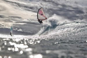 I love this photo of Russ Faurot. The sail looks amazing against the clouds.