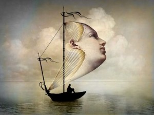 The face of the sail is full of wind, but the water is glassy and without a single whitecap. Ah! how I love the surreal.