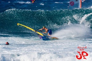 Cranking the bottom turn.