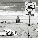 No swimming allowed, only surfing.