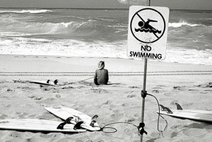 No swimming allowed, only surfing.
