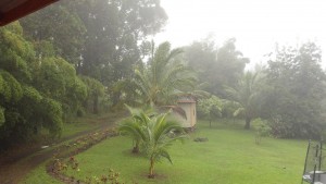 The dark clouds and pouring rain.