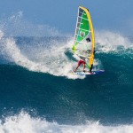 Letting the tail slide on a fun-sized cutback on a proper Hookipa swell.
