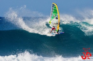 Letting the tail slide on a fun-sized cutback on a proper Hookipa swell.