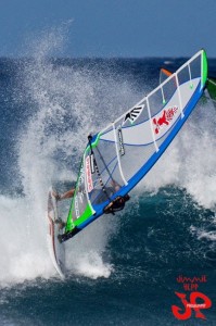 Slicing and dicing, Kevin sprays his territory at Hookipa.