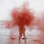 And here we find an explosion of romance on the beach.