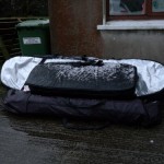 The windsurfing gear sits next to the cottage waiting, like us, for wind and waves.