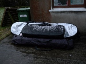 The windsurfing gear sits next to the cottage waiting, like us, for wind and waves.