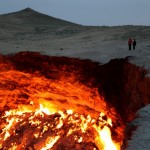 This is a pit of fire in Turkmenistan named "The Door to Hell". Even after some research, I couldn't quite find out a consistent history. But apparently it's been burning for at least 35 years due to the seeping natural gas. A mining accident possibly?