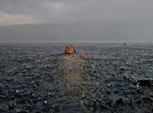 To be held by the ocean-- resting on her tummy and feeling her sweet kisses from above.