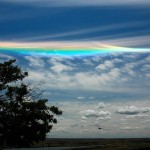 That's not a rainbow. It's the light coming through the crystals of the sky at just the right angle.