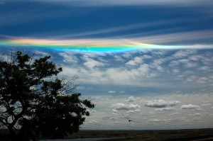 That's not a rainbow. It's the light coming through the crystals of the sky at just the right angle.