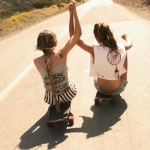 Grab hold of each other and roll forward, sans breaks of course.