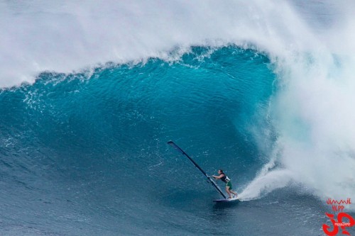 Riding in front of a small Jaws barrel. 